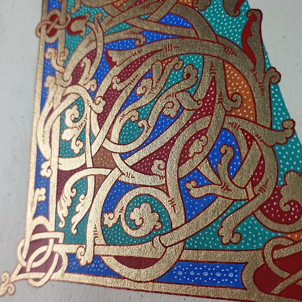 Lettre L enluminée artisanale style ottonien avec dorure.