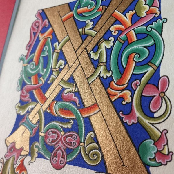 Lettera romanica miniata X