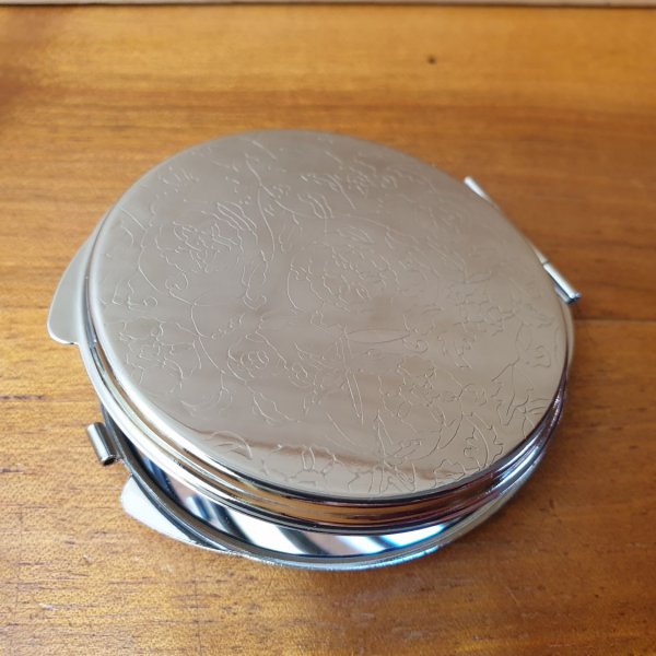 Specchio da borsa illuminato con fiori e arabeschi